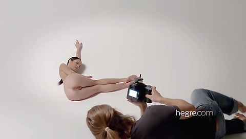 Slim brunette fucks herself with a dildo